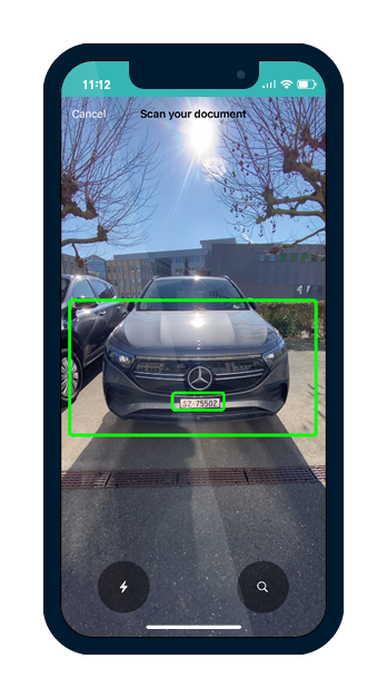 MOBILE SCAN SDK automatically identifies and scans the license plate of a car Mobile phone screen showing the MOBILE SCAN SDK automatically identifying scannable objects, in this case, the license plate of a car