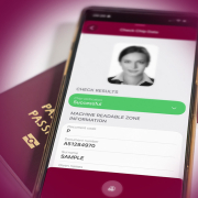 Secure digital identity verification via NFC chip reading on a smartphone, confirming the authenticity of passport chip data.